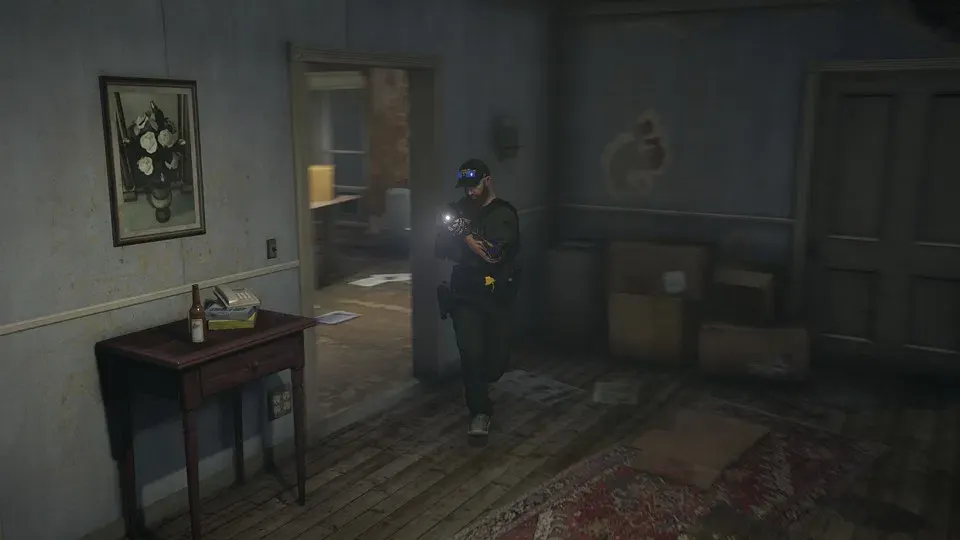 Deputy searching a house with a flashlight