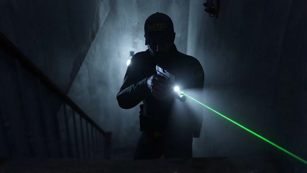 Deputy clearing a dark stairwell with a weapon light and green laser