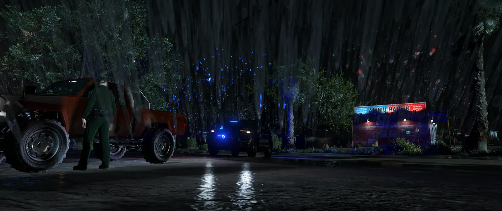 Deputy at a stop outside Ammu-Nation in the rain at night
